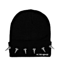 a black beanie with spikes on it